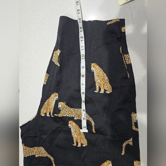 Stylish black wide-leg pants. Features a bold leopard print. - Picture 7 of 15